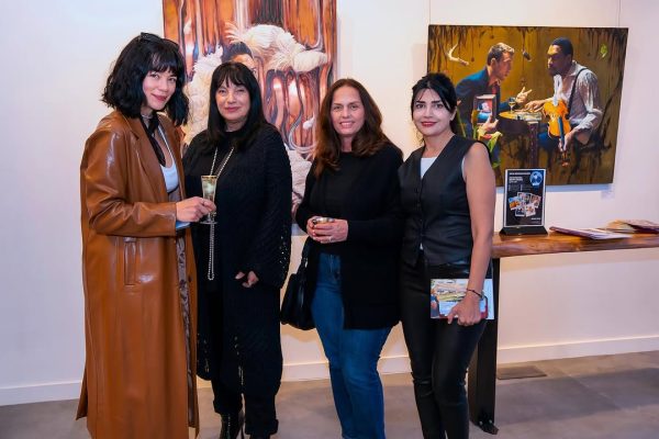 a group of women posing for a photo