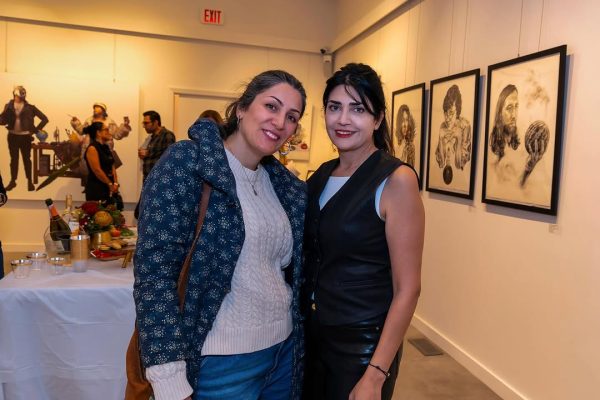 two women standing next to each other