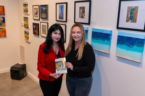 two women standing next to each other