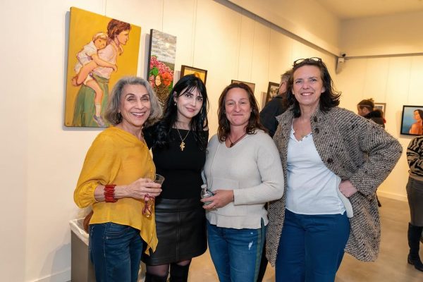 a group of women posing for a picture