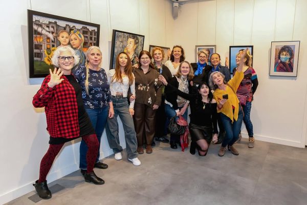 a group of women posing for a photo