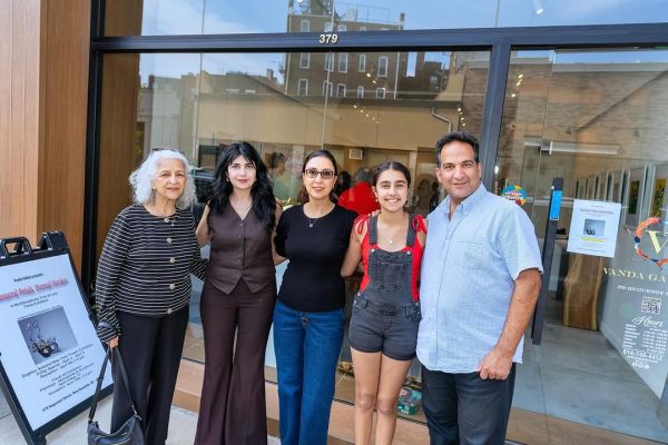 a group of people standing in front of a store