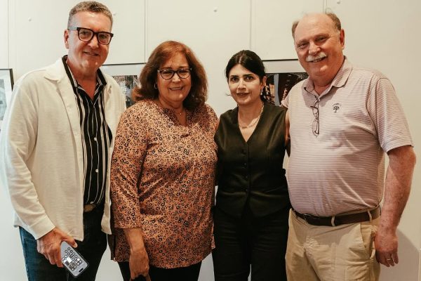 a group of people posing for a photo