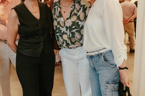a group of women posing for a picture